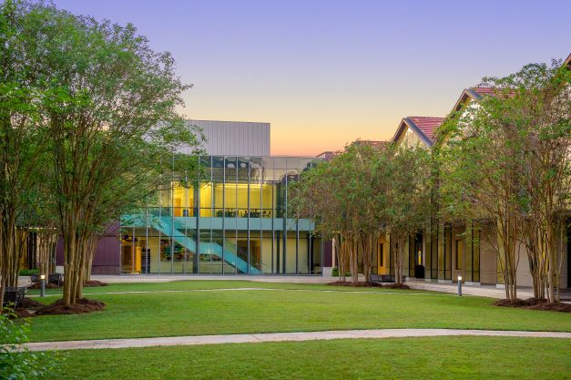 BEC Auditorium from the courtyard at dusk