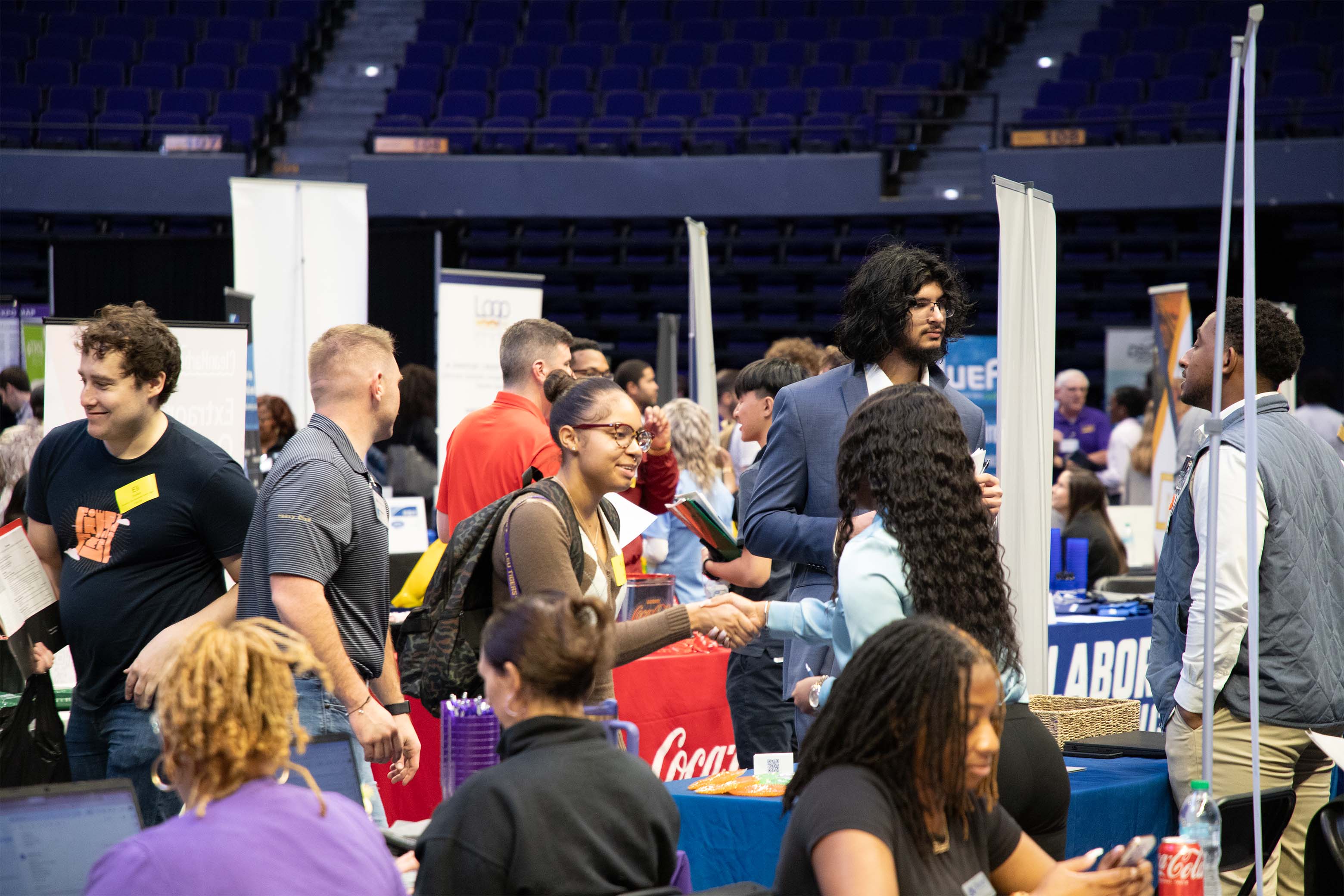 Person networking at a career fair.